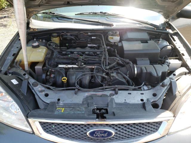 1FAHP34N65W159718 - 2005 FORD FOCUS ZX4 GRAY photo 7