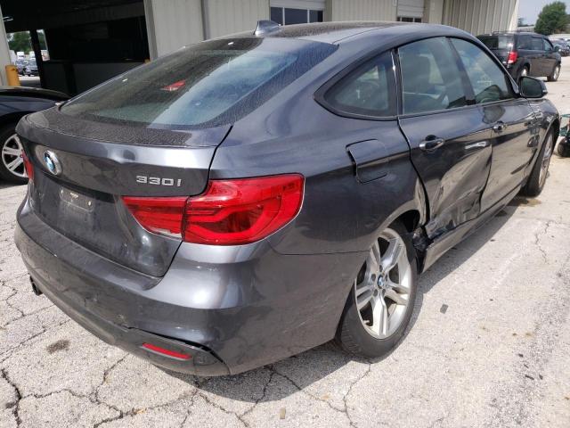 WBA8Z9C53HG452660 - 2017 BMW 330 XIGT GRAY photo 4