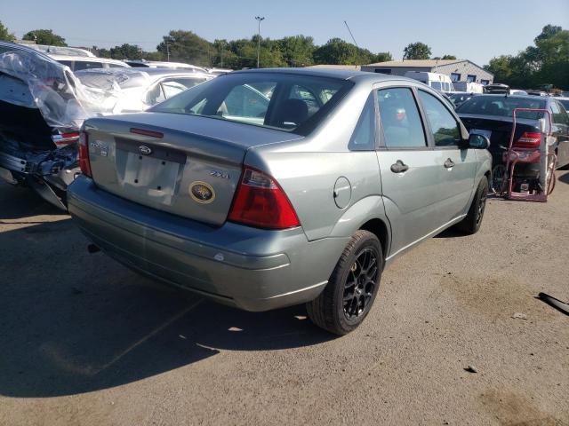1FAFP34NX5W295079 - 2005 FORD FOCUS ZX4 GRAY photo 4