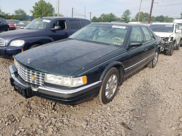 1G6KS52Y2VU830307 - 1997 CADILLAC SEDAN GREEN photo 2