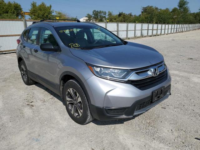 2HKRW6H31JH220856 - 2018 HONDA CR-V LX SILVER photo 1