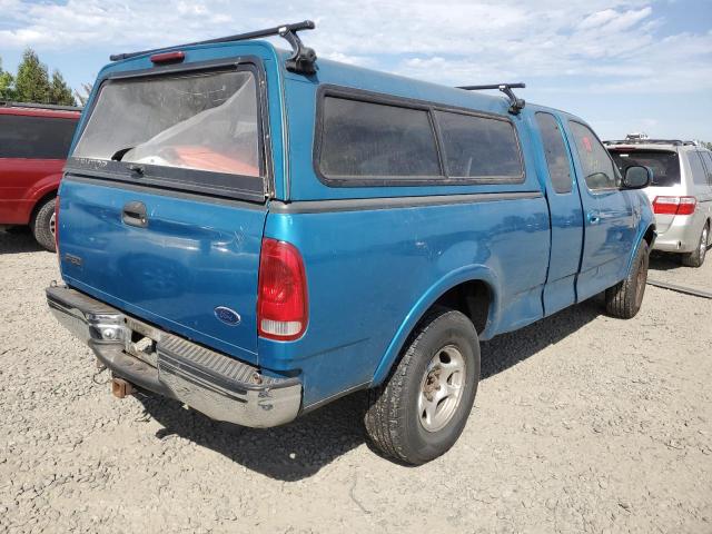 1FTZX18W3WKA53175 - 1998 FORD F150 BLUE photo 4