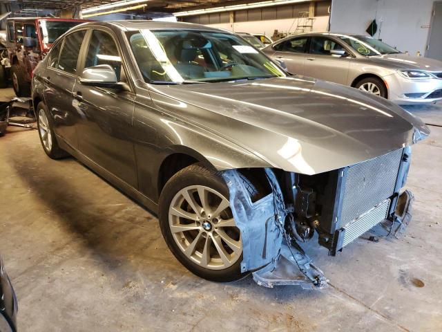 WBA8E5G33HNU43028 - 2017 BMW 320I GRAY photo 1