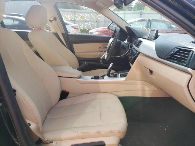 WBA8E5G58JNU47129 - 2018 BMW 320 XI BLACK photo 5