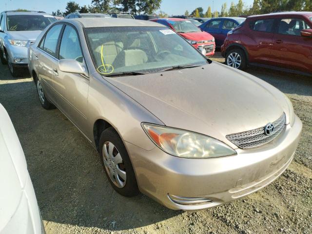 JTDBE32K420037548 - 2002 TOYOTA CAMRY LE GOLD photo 1