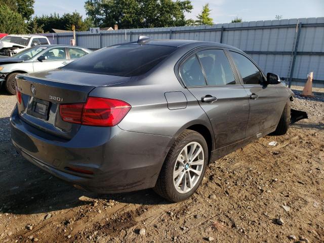 WBA8E5G52JNU45778 - 2018 BMW 320 XI GRAY photo 4