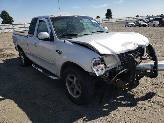 1FTRX17W61KA55898 - 2001 FORD F150 SILVER photo 1