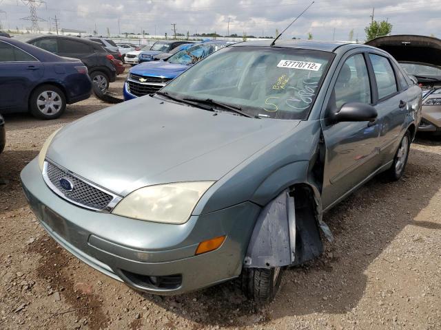 1FAFP34NX5W154898 - 2005 FORD FOCUS ZX4 GREEN photo 2