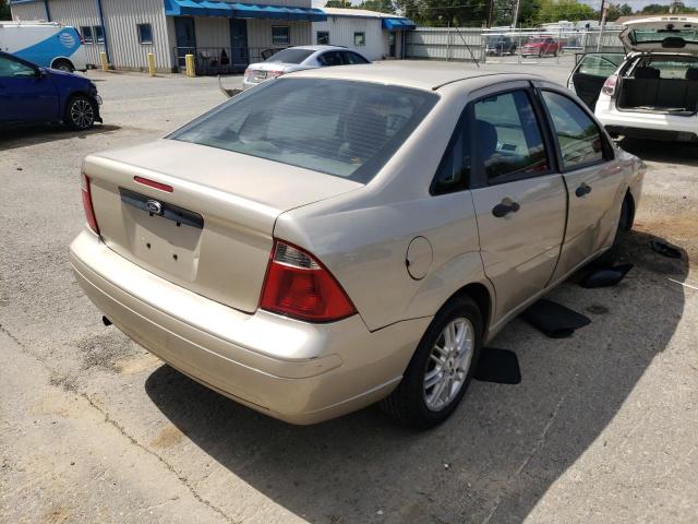 1FAFP34N76W147697 - 2006 FORD FOCUS ZX4 TAN photo 4