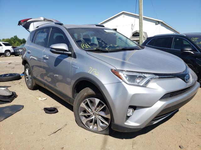 JTMRJREV0JD223209 - 2018 TOYOTA RAV4 HV LE SILVER photo 1