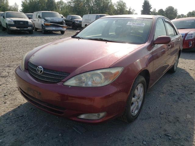 JTDBE30K430180584 - 2003 TOYOTA CAMRY LE MAROON photo 2