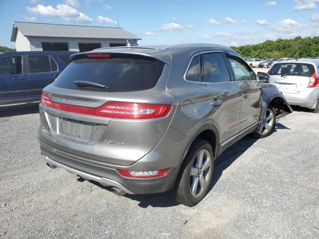 5LMCJ1D91HUL54924 - 2017 LINCOLN MKC PREMIE TAN photo 4