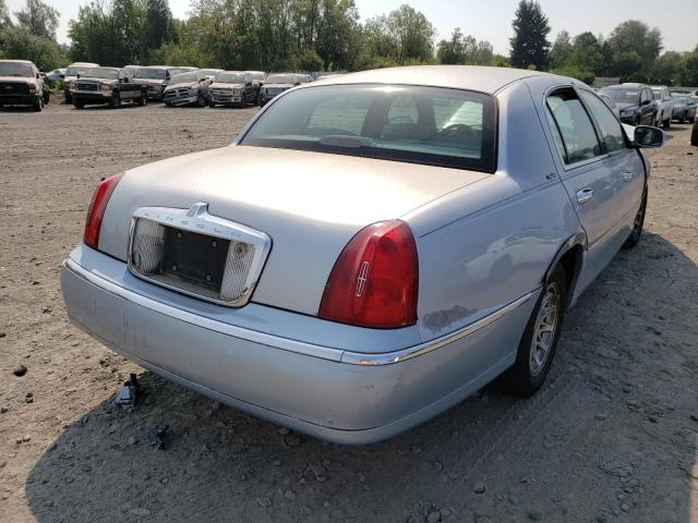 1LNFM82W7WY611194 - 1998 LINCOLN TOWN CAR S BLUE photo 4