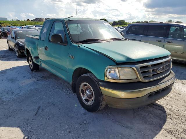 1FTZX07231KF14893 - 2001 FORD F150 GREEN photo 1