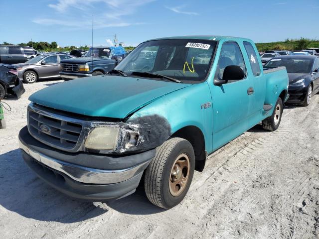 1FTZX07231KF14893 - 2001 FORD F150 GREEN photo 2