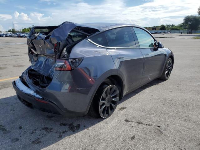 7SAYGDEE7NF320910 - 2022 TESLA MODEL Y Серый фото 4