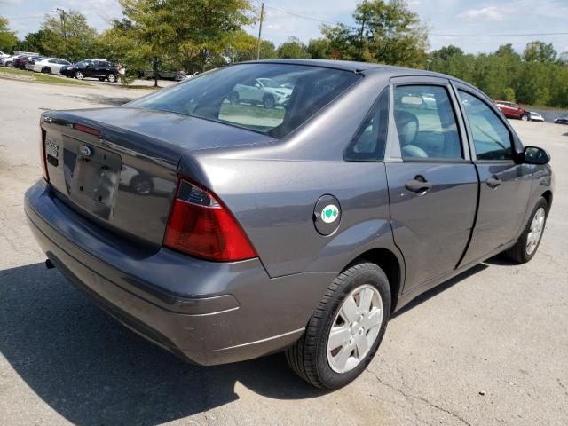 1FAFP34N57W234662 - 2007 FORD FOCUS ZX4 GRAY photo 4