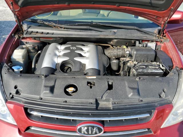 KNDMB233076142613 - 2007 KIA SEDONA RED photo 7