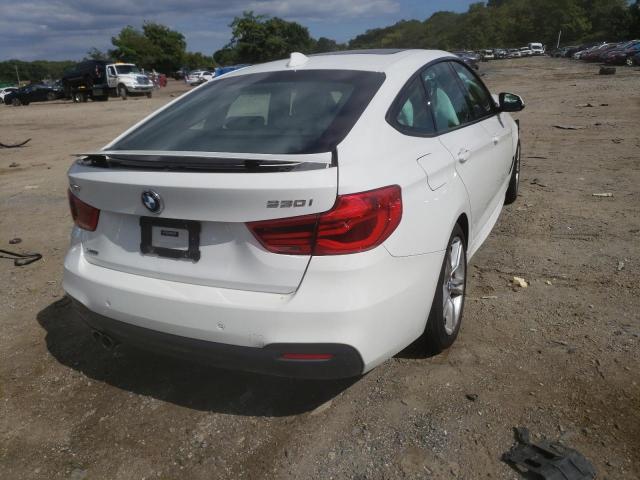 WBA8Z9C57HG453309 - 2017 BMW 330 XIGT WHITE photo 4