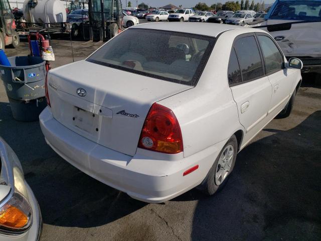 KMHCG45C75U599235 - 2005 HYUNDAI ACCENT WHITE photo 4