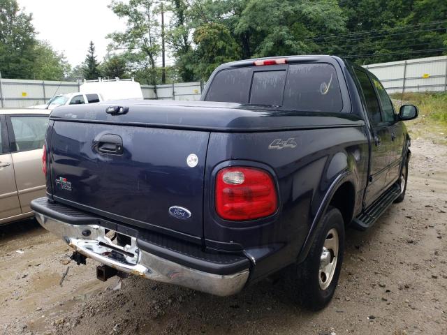 1FTRW08L71KC63547 - 2001 FORD F-150 BLUE photo 4