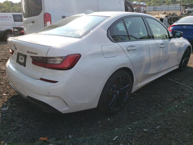 3MW5U9J03M8B89877 - 2021 BMW M340XI WHITE photo 4