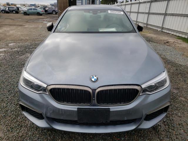 WBAJB9C51KB289159 - 2019 BMW M550XI GRAY photo 9