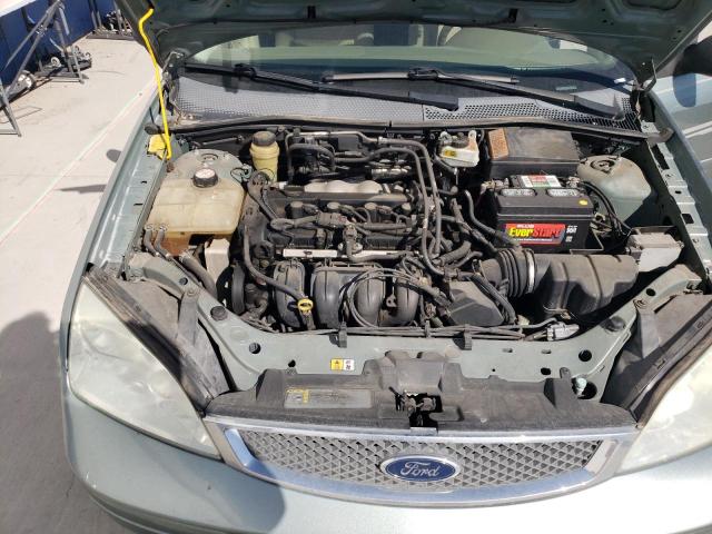 1FAFP34N35W121810 - 2005 FORD FOCUS ZX4 TEAL photo 7