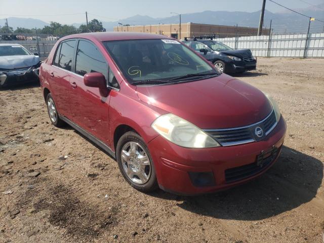 3N1BC11E49L372072 - 2009 NISSAN VERSA S RED photo 1