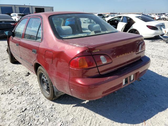 1NXBR12E3YZ304548 - 2000 TOYOTA COROLLA VE RED photo 3