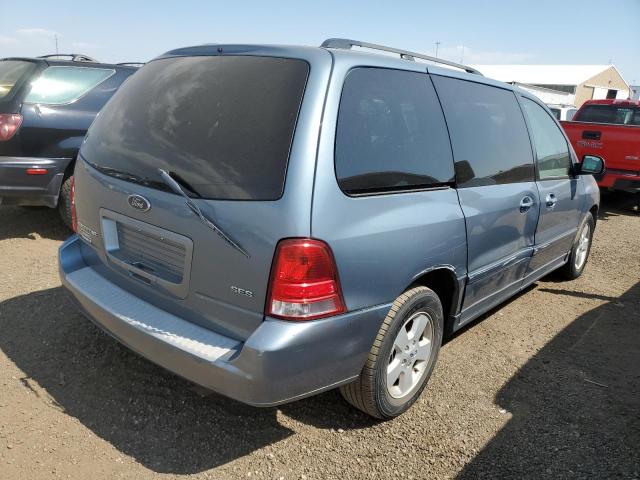 2FMZA57644BA70497 - 2004 FORD FREESTAR S BLUE photo 4