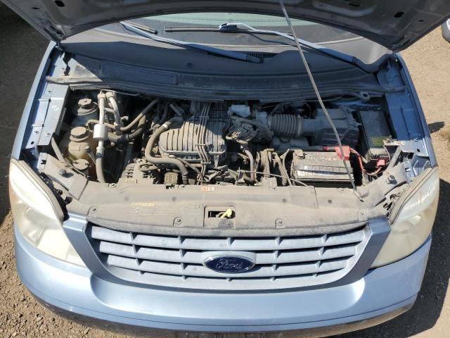 2FMZA57644BA70497 - 2004 FORD FREESTAR S BLUE photo 7