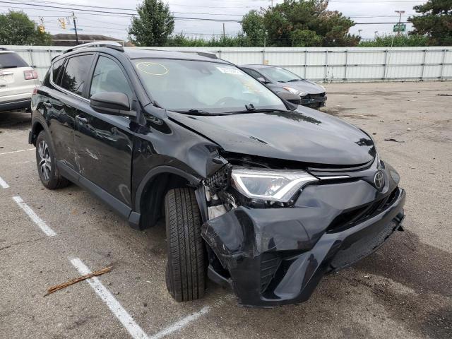 2T3BFREV2JW807732 - 2018 TOYOTA RAV4 LE BLACK photo 1