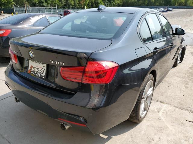 WBA8B7C50JA585877 - 2018 BMW 340 XI BLACK photo 4