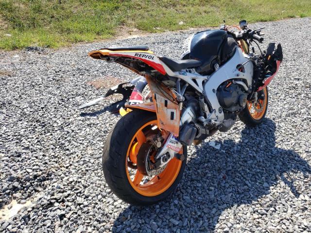 JH2SC59J39K000351 - 2009 HONDA CBR1000 RR ORANGE photo 4