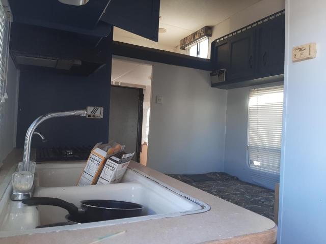 4YDT29F2337307806 - 2003 KEYSTONE HORNET WHITE photo 6