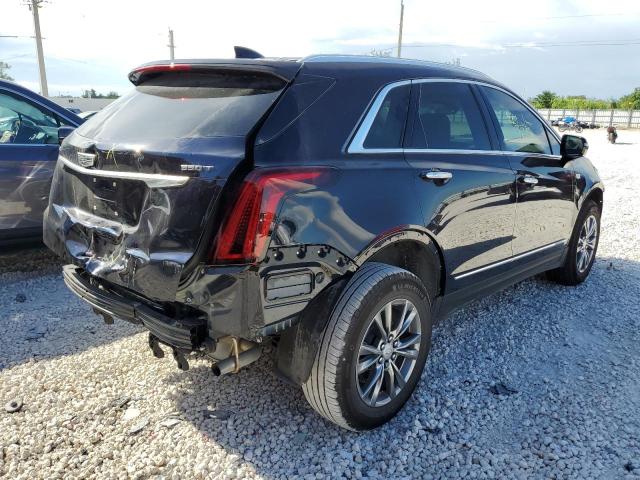 1GYKNCR44MZ178037 - 2021 CADILLAC XT5 PREMIU BLUE photo 4