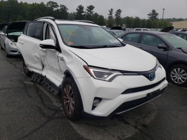 JTMRJREV2HD126975 - 2017 TOYOTA RAV4 HV LE WHITE photo 1