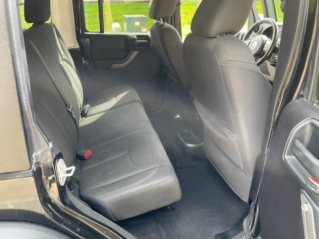 1C4BJWDG8JL881935 - 2018 JEEP WRANGLER U შავი ფოტო 6