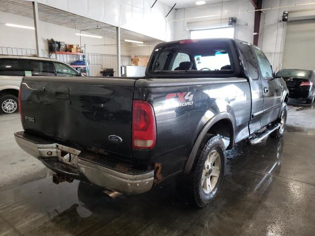 2FTRX18W72CA61407 - 2002 FORD F150 BLACK photo 4