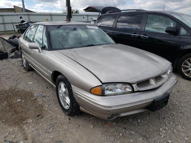 1G2HX52K9VH277494 - 1997 PONTIAC BONNEVILLE TAN photo 1