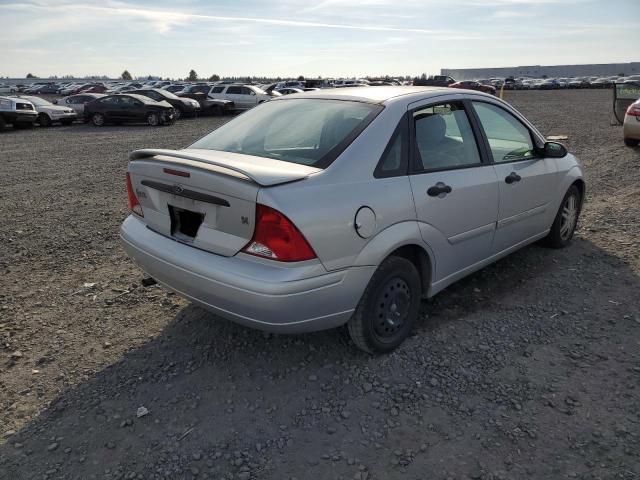 1FAFP34371W209915 - 2001 FORD FOCUS SILVER photo 4