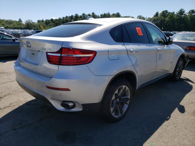 5UXFG2C52E0H10941 - 2014 BMW X6 XDRIVE3 SILVER photo 4