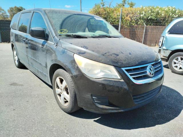 2V4RW3D14AR263132 - 2010 VOLKSWAGEN ROUTAN SE BLACK photo 1