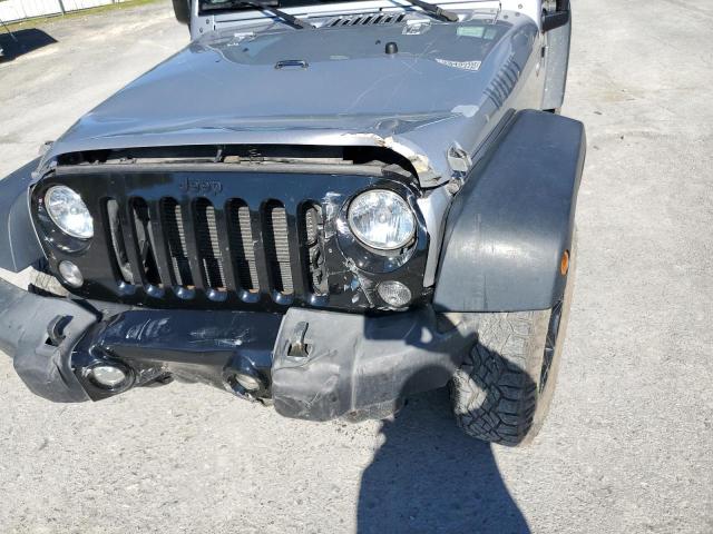 1C4AJWAG2FL714199 - 2015 JEEP WRANGLER S SILVER photo 9