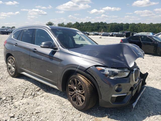 WBXHT3Z37G4A47799 - 2016 BMW X1 XDRIVE2 GRAY photo 1