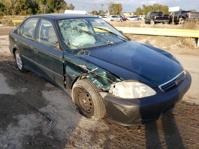 2HGEJ661XYH579822 - 2000 HONDA CIVIC BASE GREEN photo 1