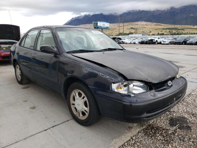 1Y1SK5487XZ404222 - 1999 CHEVROLET GEO PRIZM BLACK photo 1