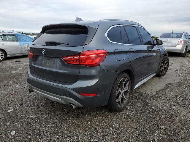 WBXHT3C33H5F82715 - 2017 BMW X1 XDRIVE2 GRAY photo 4