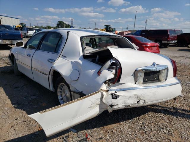 1LNHM81W2XY632952 - 1999 LINCOLN TOWN CAR E WHITE photo 9